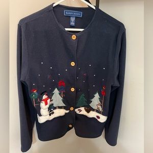 Ladies, holiday sweater with snowman and Christmas tree print in good condition.